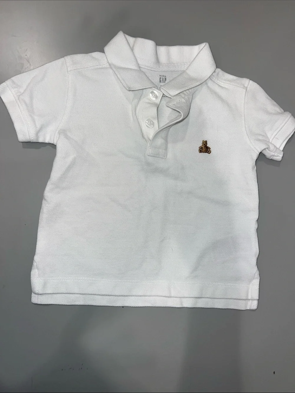 Gap Lot - A collared shirt, onesie, and shorts from Gap